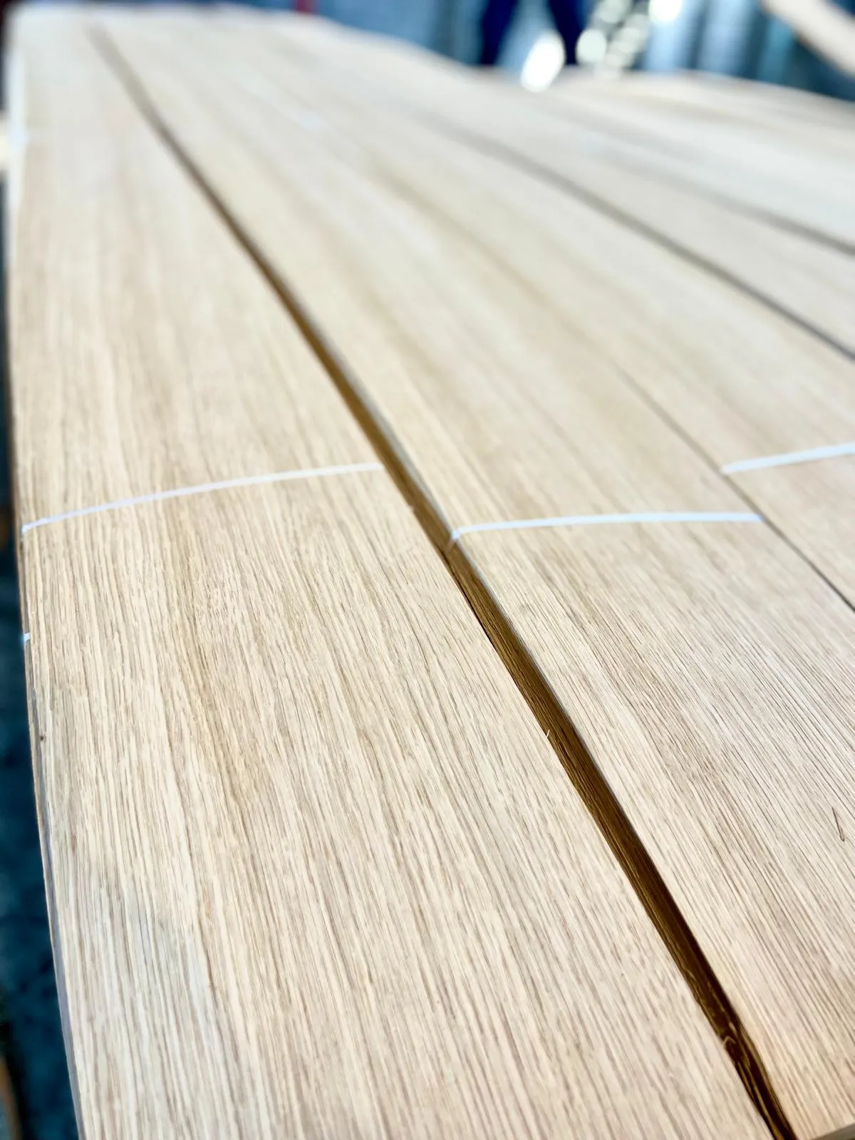 Bundle of light-coloured wood veneer