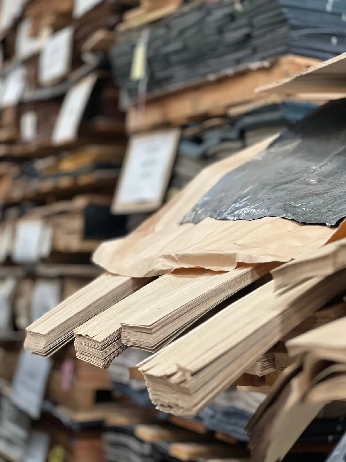 Veneer samples stacked on shelves